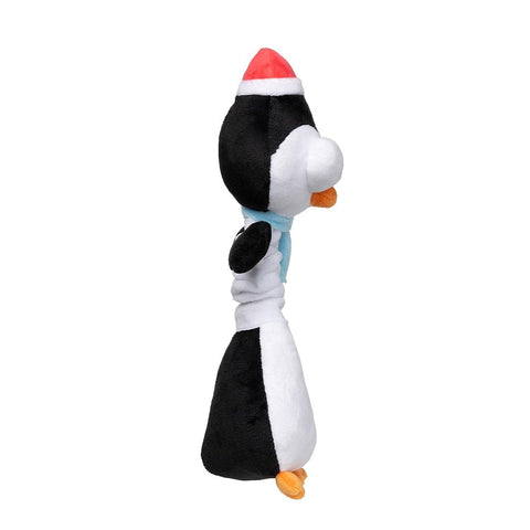 Zijaanzicht van een zwart-witte pluche pinguïn als hondenspeeltje met kerstmuts