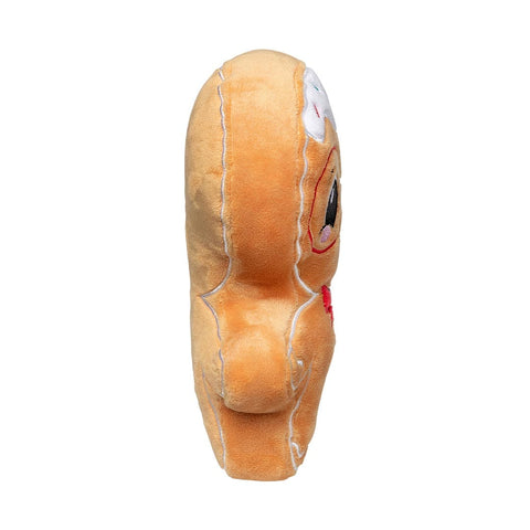 Zijaanzicht van een groot pluche peperkoekfiguur als hondenspeeltje met glazuur