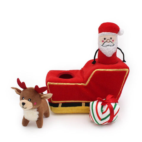 ZippyPaws Holiday Burrow Santa’s Sleigh – interactief kerst-verstopspeelgoed voor honden, pluche arrenslee met piepende kerstman, rendier en cadeautje
