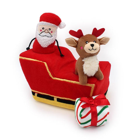 ZippyPaws Holiday Burrow Santa’s Sleigh – interactief kerst-verstopspeelgoed voor honden, pluche arrenslee met piepende kerstman, rendier en cadeautje