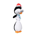 Pluche pinguïn als hondenspeeltje schuin van voren met kerstmuts en blauwe sjaal