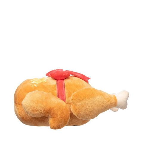 FuzzYard Let’s Get Basted Roast – kerst hondenspeeltje van FuzzYard, close-up van zachte pluche kalkoen met rode strik